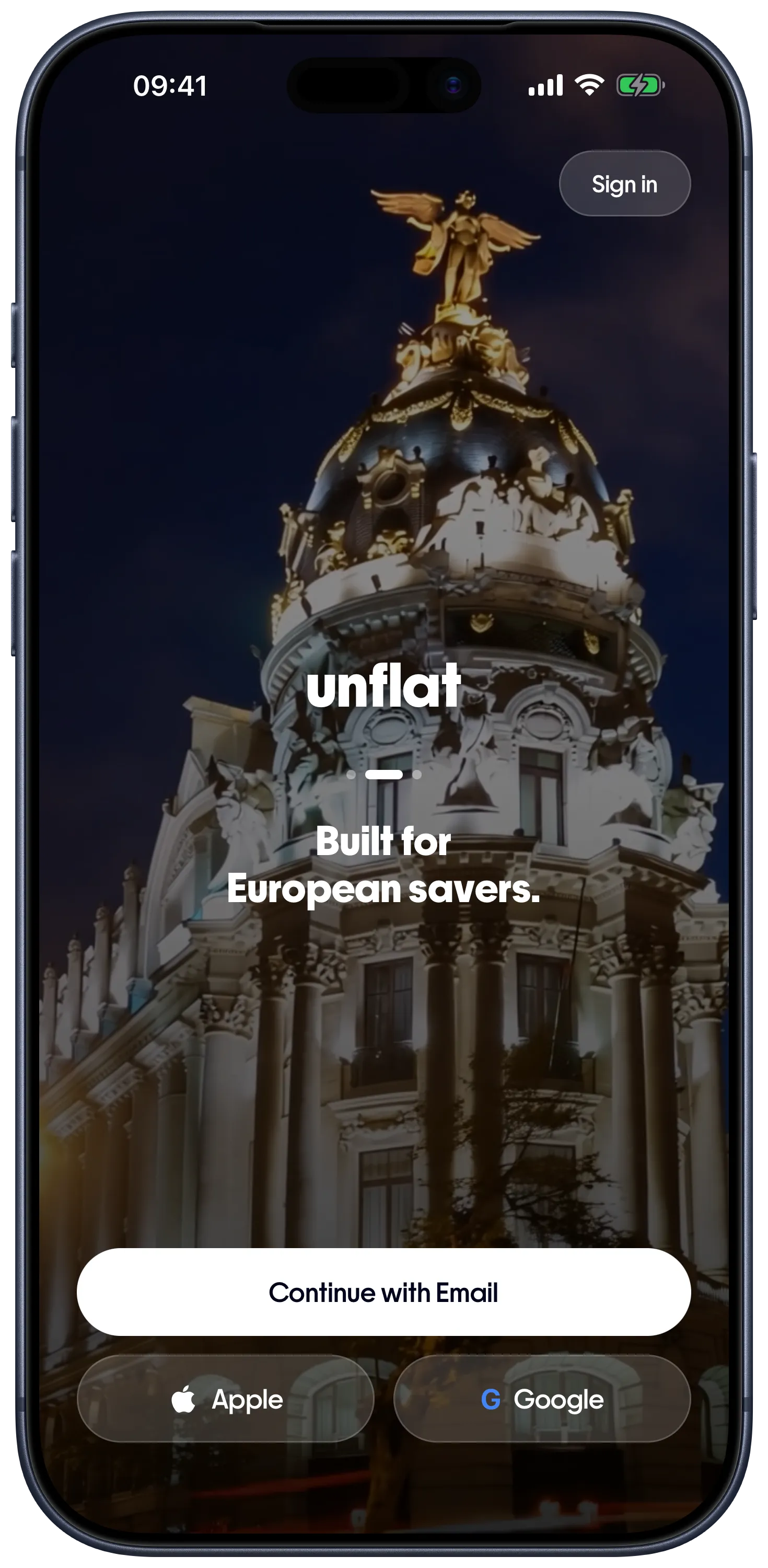 La schermata di benvenuto dell’app di unflat, con le opzioni per continuare con email, Apple o Google.